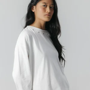 CAMISETA TEEN MANGA LARGA TACHAS BLANCO PURO